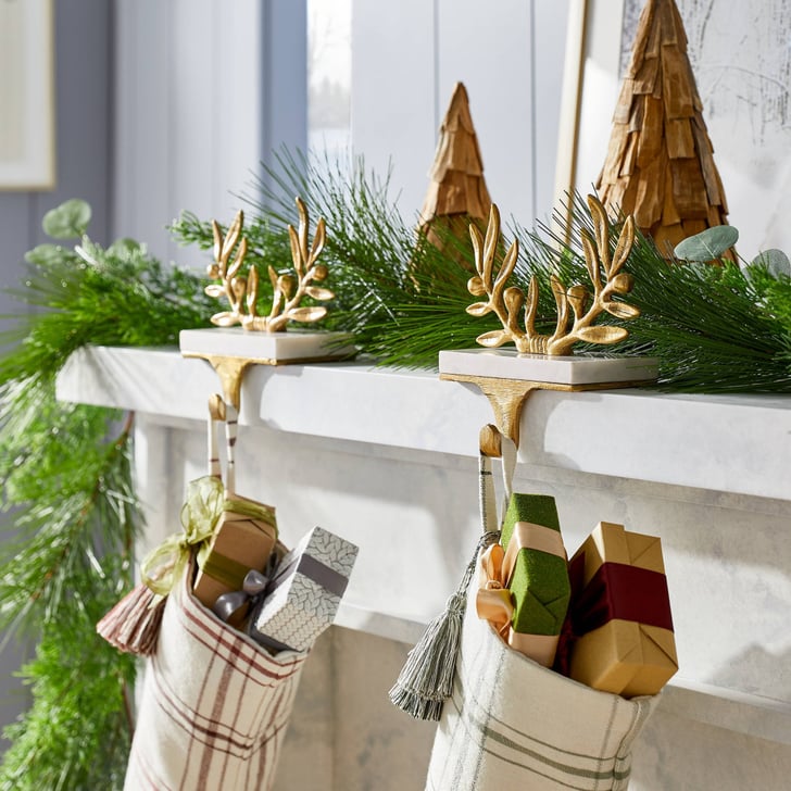 A Stocking Holder Threshold designed with Studio McGee Brass Semi