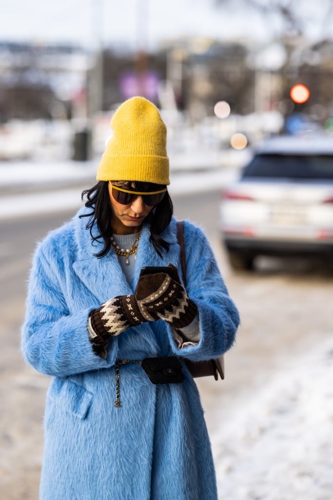 Go for the Bernie vibe and try youthful, fair-isle patterned gloves with a beautiful blue coat and some statement fashion accessories.