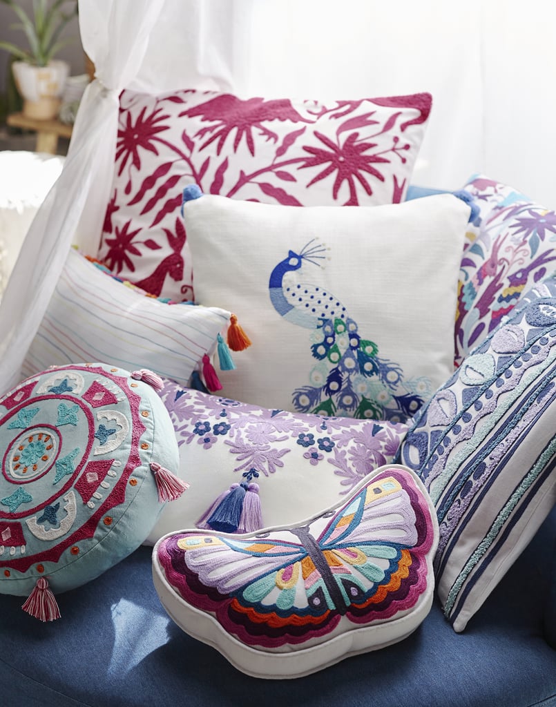 Products pictured: Folk Gardens Euro Pillow Cover ($49), Free Spirit Pillow Cover ($39), Enchanted Forest Pillow Cover ($45), Butterfly Pillow ($45), Embroidered Peacock Pillow Cover ($45)