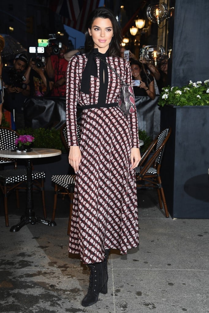 Kendall wore a printed Longchamp dress when she attended the brand's store opening in New York.