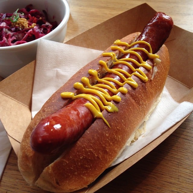 She's Not Too Fancy to Tuck Into a Hot Dog