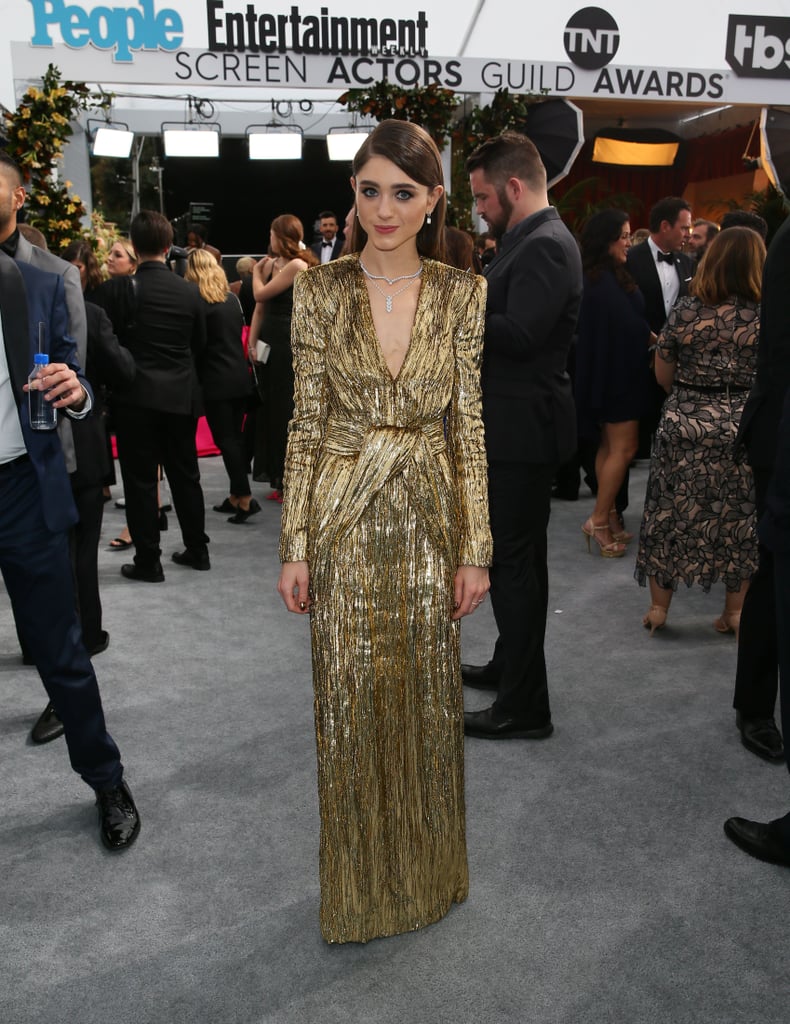 Natalia Dyer Gold Saint Laurent Dress at the SAG Awards