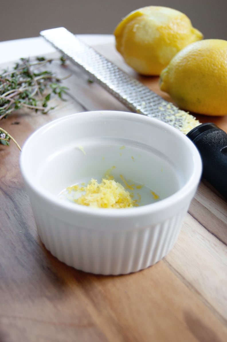 Prep a couple lemons and a few sprigs of thyme.