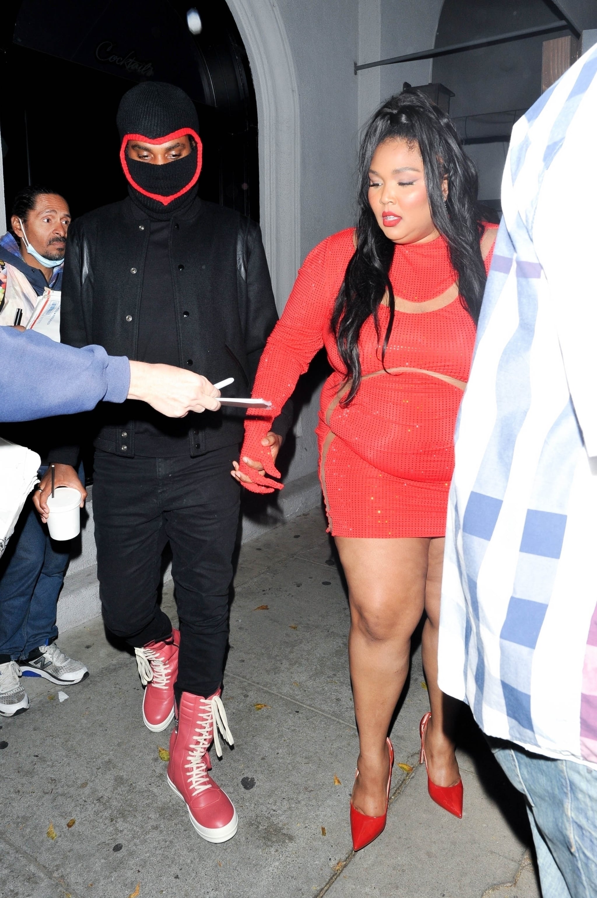 West Hollywood, CA-* Exclusive *-Rizzo looks bright red when going out with a mysterious man masked for a Valentine's Day dinner date at Craig's in West Hollywood. 1 310 798 9111 / usasales@backgrid.com UK: +44 208 344 2007 / uksales@backgrid.com * UK Client-Pixelize your face before publishing photos including children *