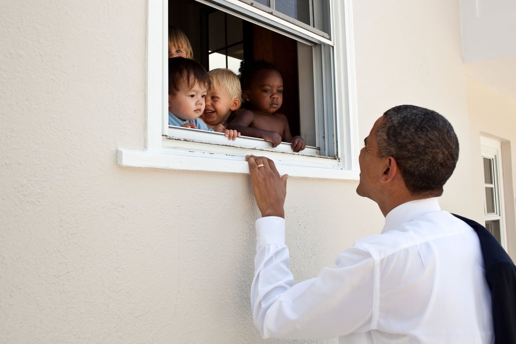 Greeting children at a Maryland day care in 2011.
