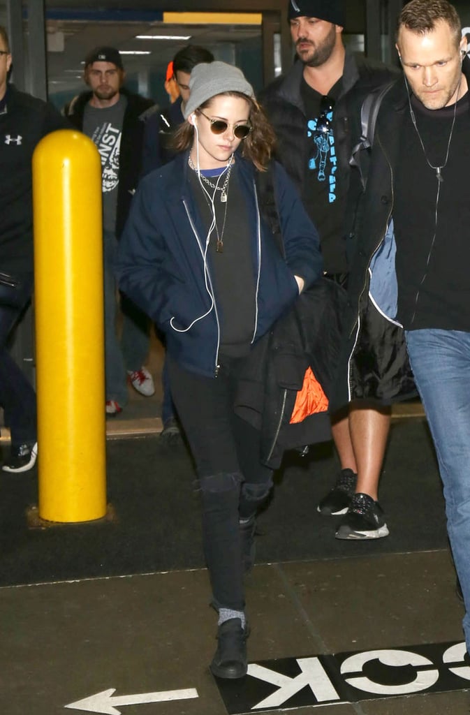 Kristen Stewart was fresh off the plane in a beanie and a bomber.