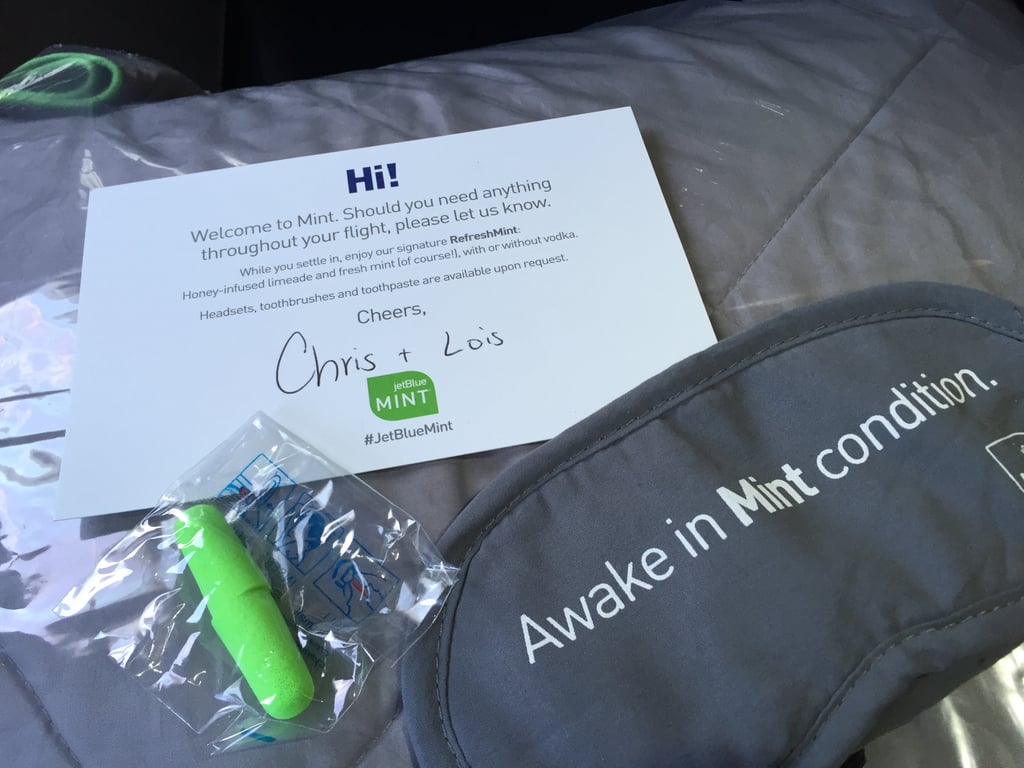 The first perk to flying Mint is being in the first group to board. On our seats were blankets, eye masks, ear plugs, and a signed welcome note.