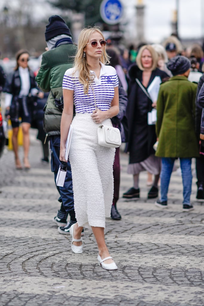 Quintessentially Summer, blue and white stripes pair perfectly with white pants and cute flats.