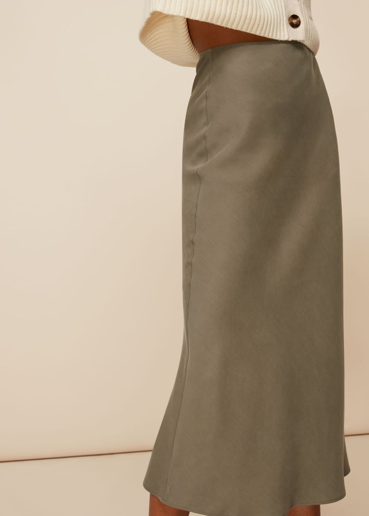 Speaking of high-waisted bottoms, a slinky midi skirt is the ideal day-to-night piece. This Whistles May Bias Cut Skirt ($179) will retain its flattering drape and smooth look and feel whether you're going from brunch to bar or desk to dinner.