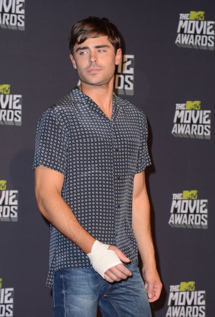 It was three years before he returned to the MTV Movie Awards in 2013. And he had a broken hand!