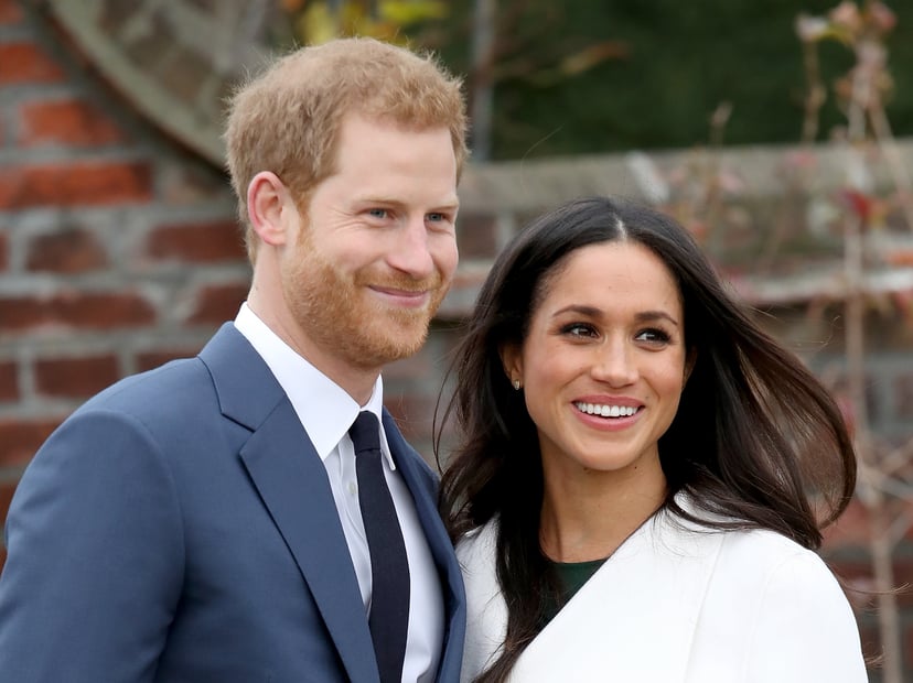 LONDON, ENGLAND - NOVEMBER 27:  Prince Harry and actress Meghan Markle during an official photocall to announce their engagement at The Sunken Gardens at Kensington Palace on November 27, 2017 in London, England.  Prince Harry and Meghan Markle have been 