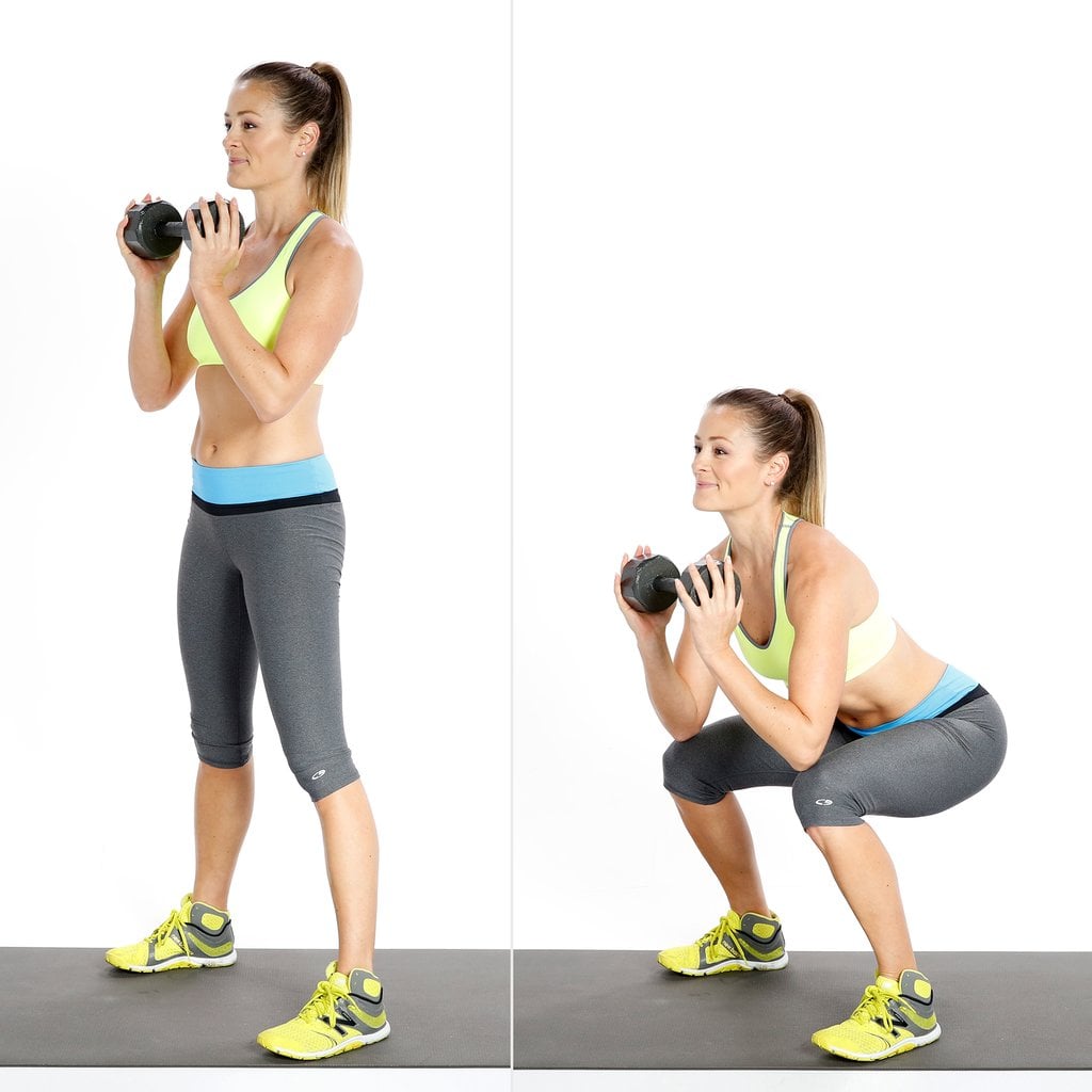 Squat holding a dumbell