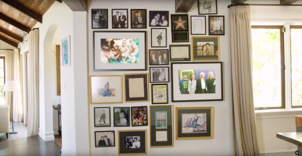 The main room has a wall that's positively plastered with family photos and snaps of John with other famous faces. The main room has a wall that's positively plastered with family photos and snaps of John with other famous faces.