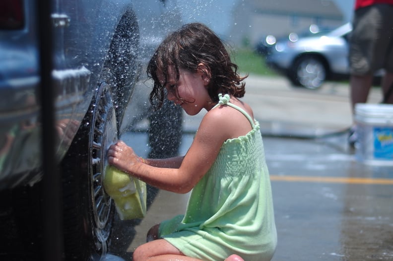 Wash cars in the driveway.