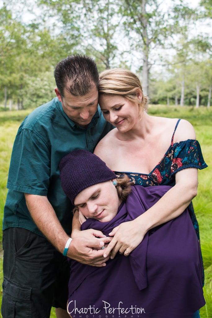 Couple Does Newborn Photo Shoot With Adult Son