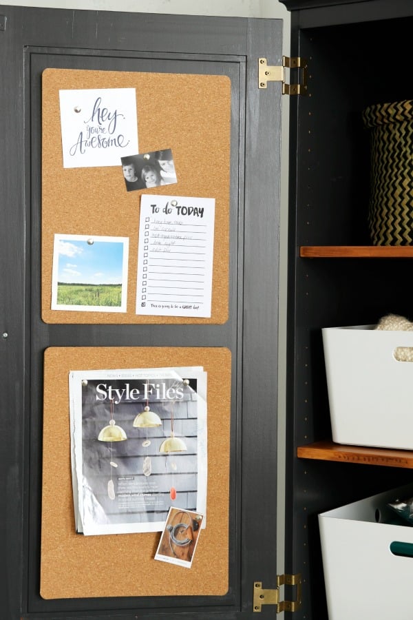 Line cabinets with corkboard.