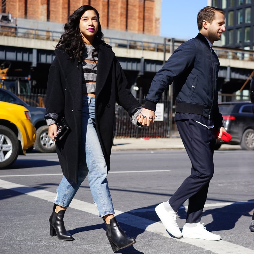 With a Black Coat, Striped Shirt, and Black Booties