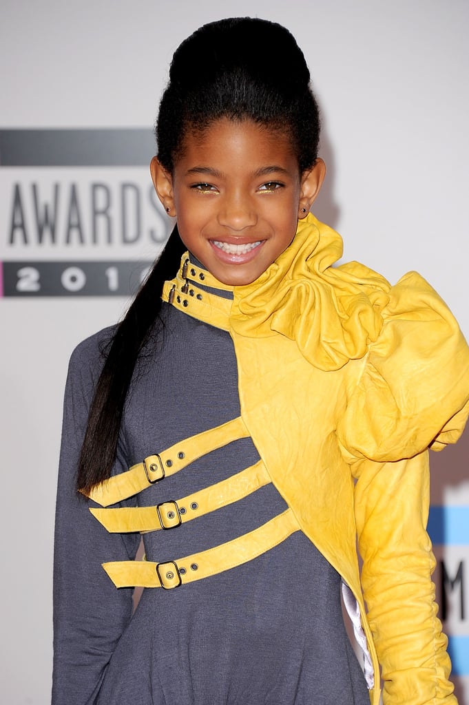 A voluminous updo allows Willow's statement-making yellow eyeliner to steal the show.