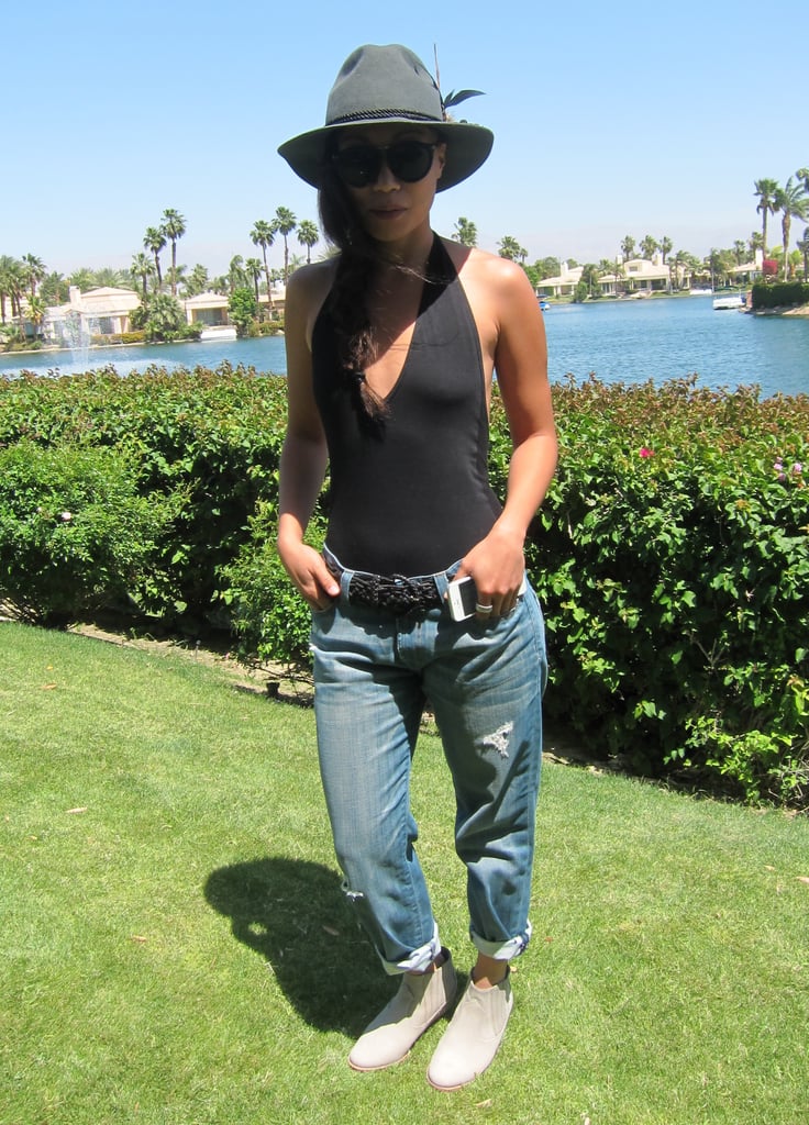 Hugo Boss PR guru Catherine Kim showed off her cool Coachella party style in a pair of boyfriend jeans, black halter bodysuit, and feathered fedora.
Source: Meg Cuna