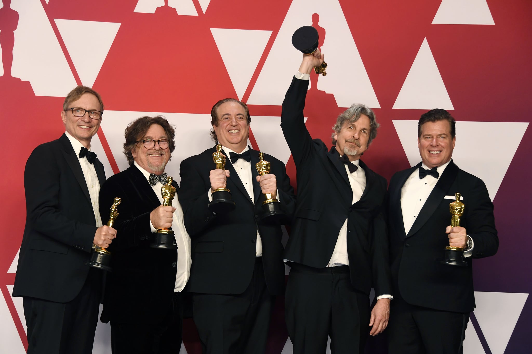 HOLLYWOOD, CALIFORNIA - FEBRUARY 24: (L-R) Jim Burke, Charles B. Wessler, Nick Vallelonga, Peter Farrelly, and Brian Currie, winners of Best Picture for HOLLYWOOD, CALIFORNIA - FEBRUARY 24: (L-R) Jim Burke, Charles B. Wessler, Nick Vallelonga, Peter Farrelly, and Brian Currie, winners of Best Picture for