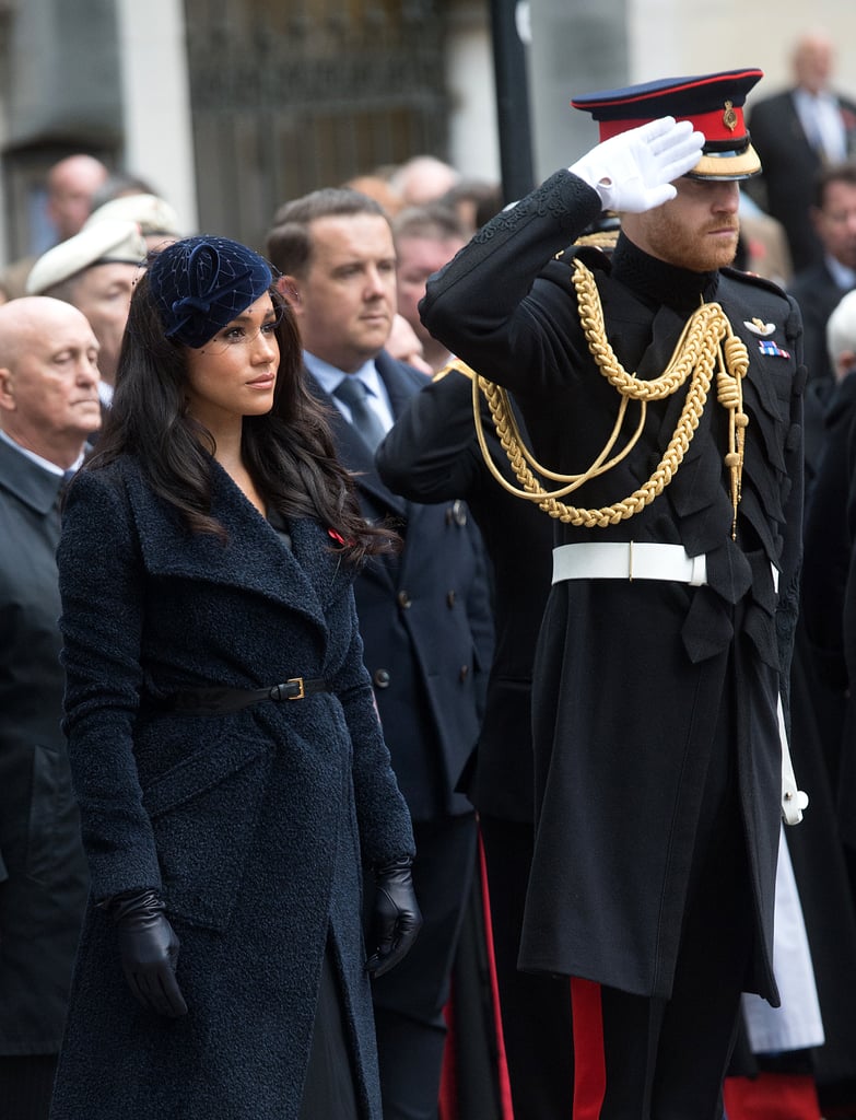 Prince Harry and Meghan Markle attended the first of a series of important remembrance events on Thursday when they paid a visit to the Field of Remembrance at Westminster Abbey. Organised by The Poppy Factory, the Field of Remembrance has been held in the grounds of the Abbey since November 1928, and features hundreds of wooden crosses decorated with poppies, in tribute to those who lost their lives serving in the armed forces. During their visit, the royal couple both laid their own crosses in a larger arrangement. Harry, in full uniform, gave a salute, while Meghan lowered her head out of respect, before they listened to "The Last Post", the famous bugle call played at Commonwealth military funerals and remembrance events.
Harry and Meghan were supposed to be joined by the Duchess of Cornwall for this event, one of a number of royal engagements over the coming days in the run up to Armistace Day. Unfortunately, Camilla had to cancel her appearance due to a chest infection, therefore Harry and Meghan represented the royal family alone. As a military man himself, with years of service and two tours of Afghanistan under his belt, nobody was better placed to do this than the Duke of Sussex. Keep reading to see photos from this poignant event.