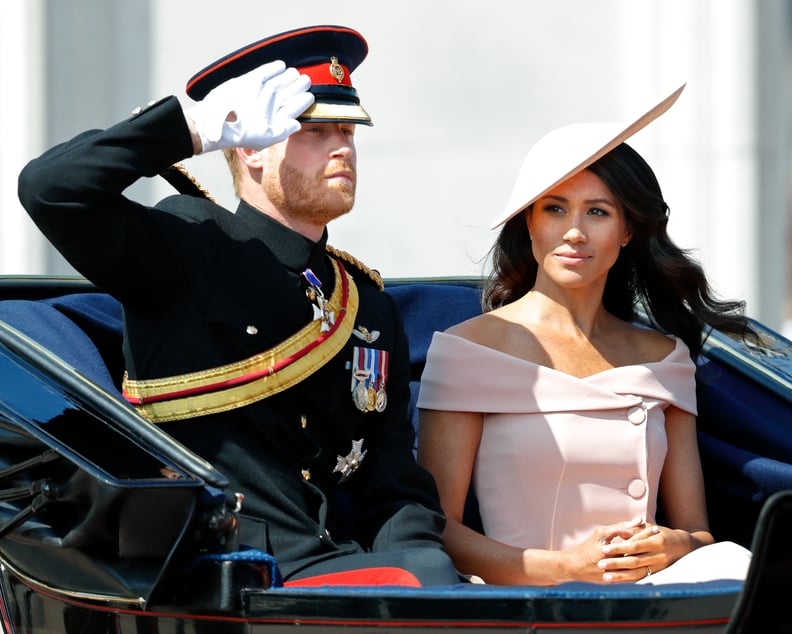 LONDON, UNITED KINGDOM - JUNE 09: (EMBARGOED FOR PUBLICATION IN UK NEWSPAPERS UNTIL 24 HOURS AFTER CREATE DATE AND TIME) Prince Harry, Duke of Sussex and Meghan, Duchess of Sussex travel down The Mall in a horse drawn carriage during Trooping The Colour 2
