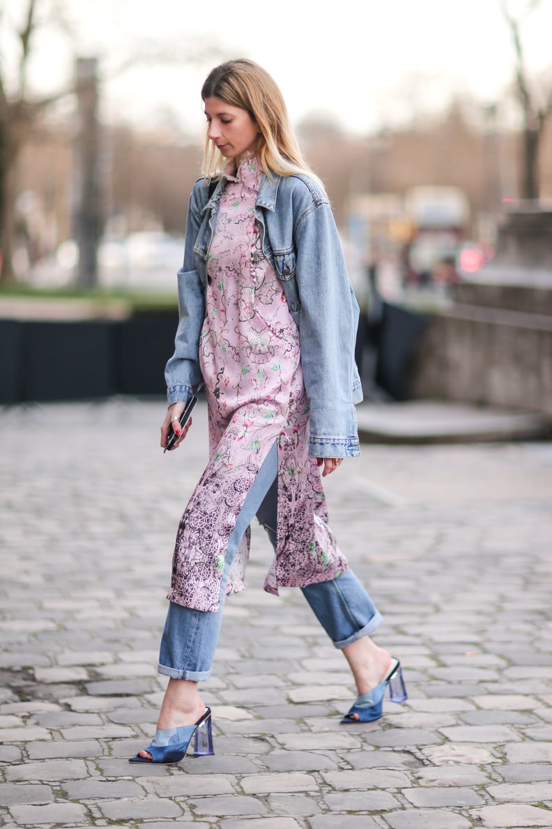 A Dress Worn Over Jeans Topped Off With a Chambray Jacket