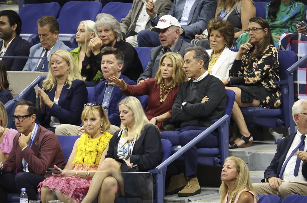 Rick Astley (middle row, second from left) with Jessica and Jerry Seinfeld sitting in front of Jon Bon Jovi (back row, black shirt) at the US Open men's championship match on Sept. 11.