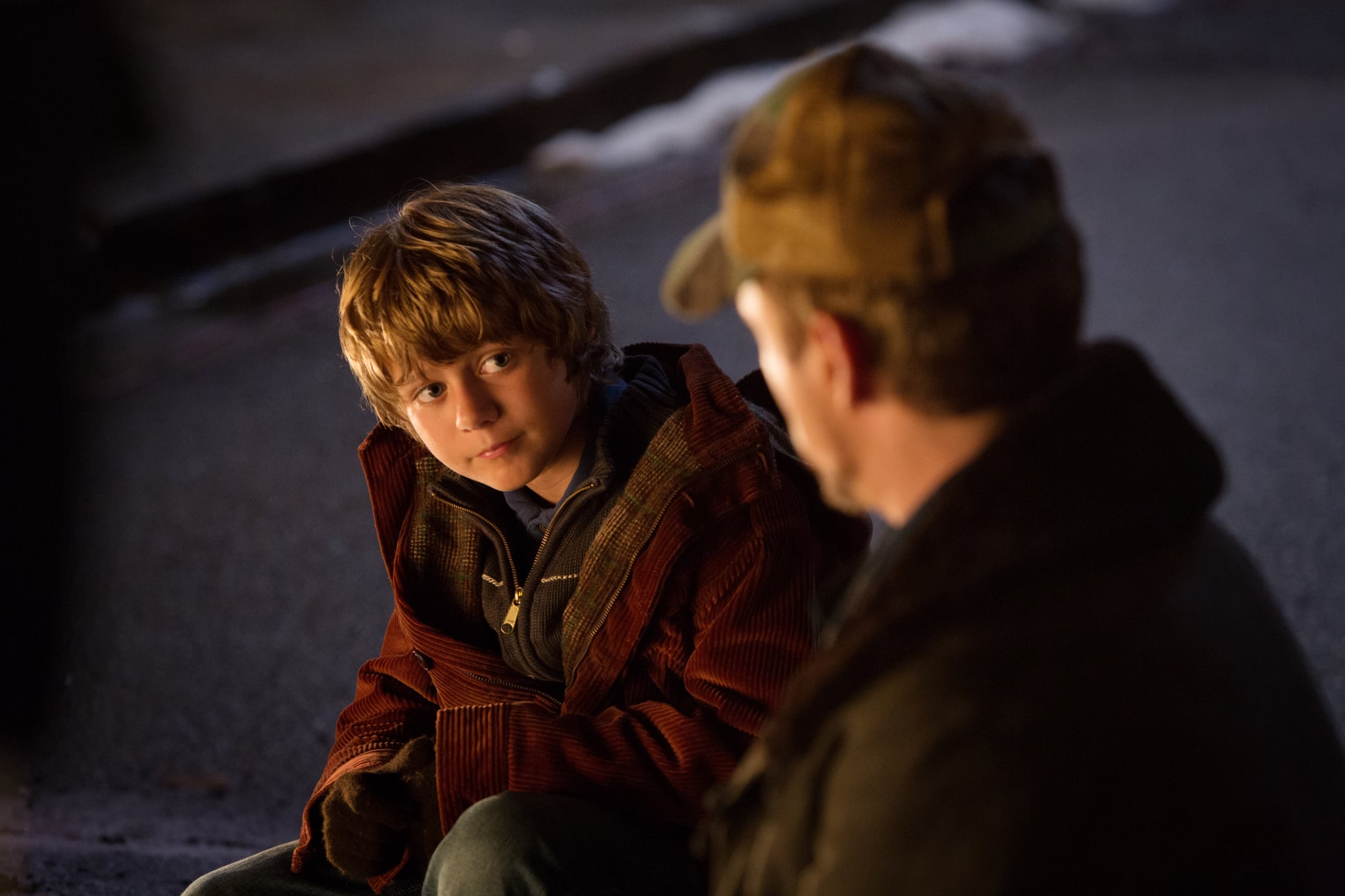 IRON MAN 3, from left: Ty Simpkins, Robert Downey Jr. as Iron Man, 2013. ph: Zade Rosenthal/Walt Disney Pictures/courtesy Everett Collection