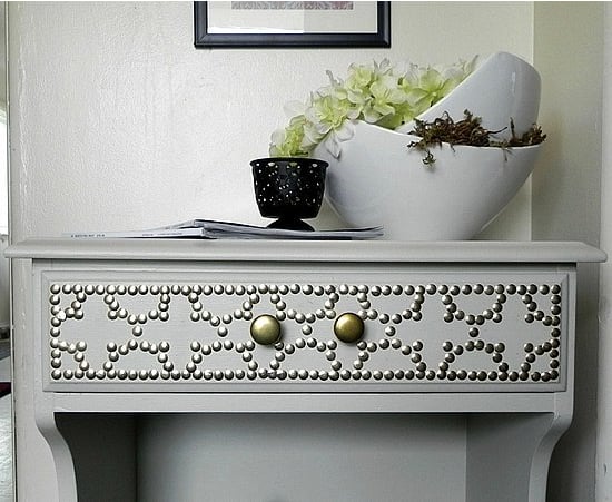 Can you believe that Decor Hacks made this nailhead side table for less than $6?
Source: Decor Hacks