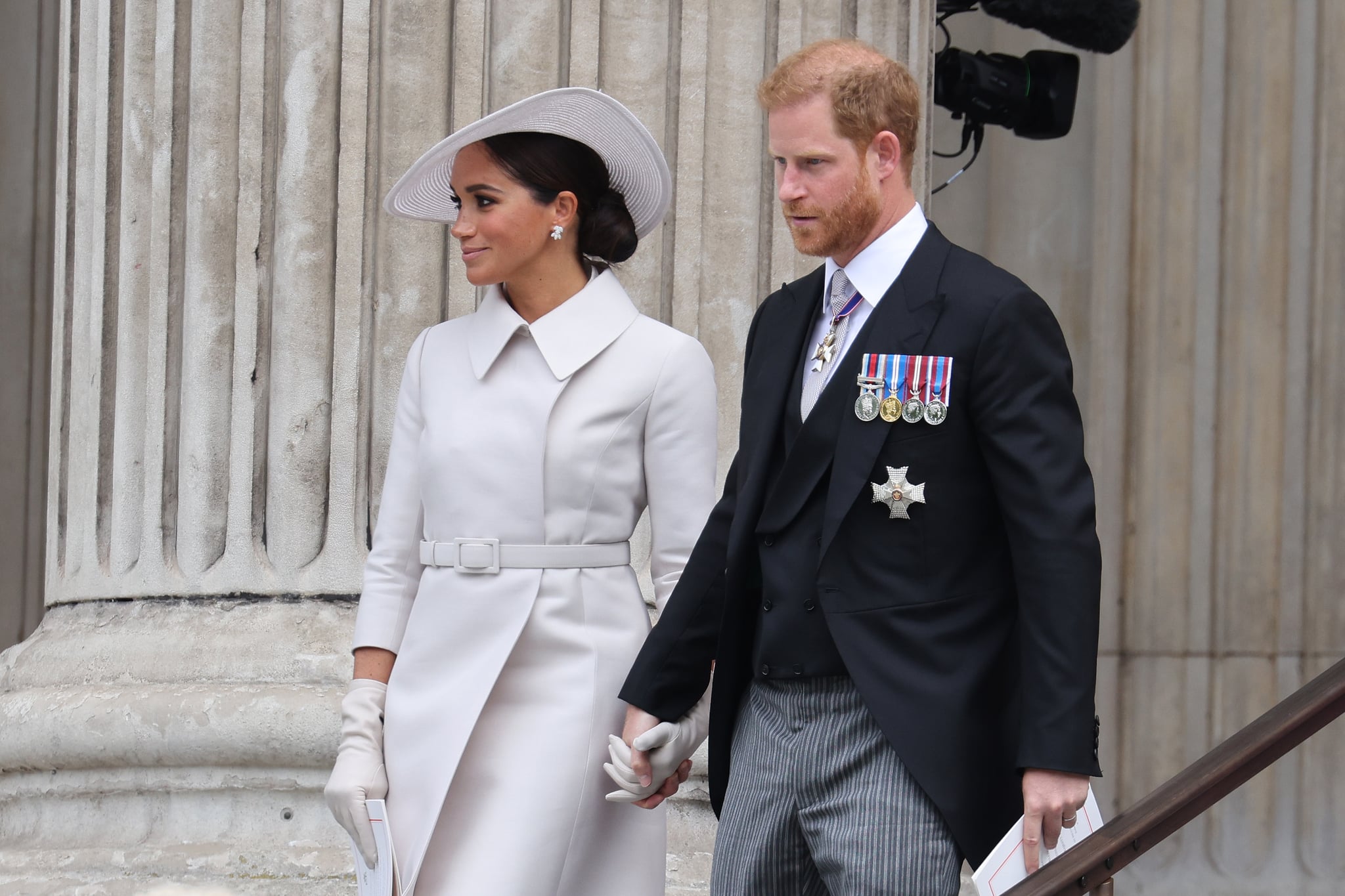 LONDON, ENGLAND - JUNE 03: Meghan, Duchess of Sussex and Prince Harry, Duke of Sussex departing St. Paul's Cathedral after the Queen Elizabeth II Platinum Jubilee 2022 - National Service of Thanksgiving on June 03, 2022 in London, England. The Platinum Jubilee of Elizabeth II is being celebrated from June 2 to June 5, 2022, in the UK and Commonwealth to mark the 70th anniversary of the accession of Queen Elizabeth II on 6 February 1952. (Photo by Neil Mockford/GC Images)