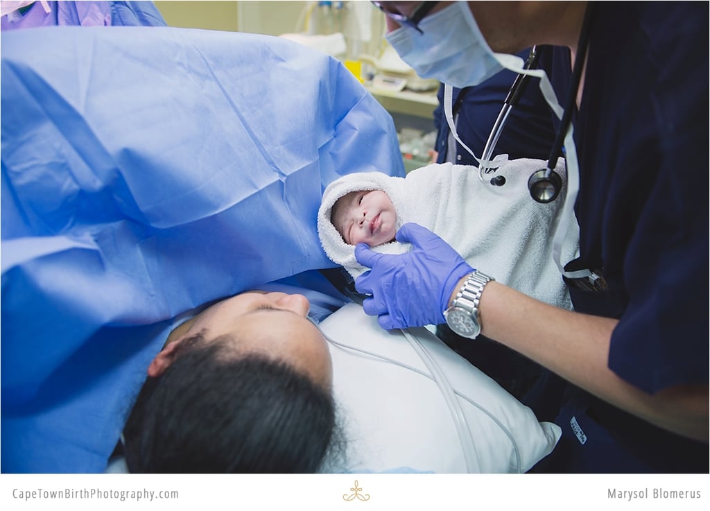 Birth Photos and Sibling Meeting Baby