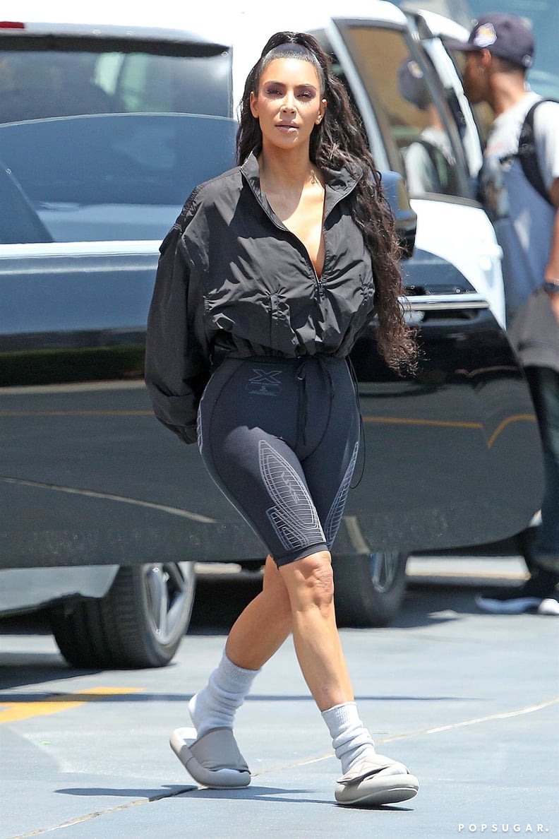 Kim Kardashian Wearing Yeezy Slides and Socks