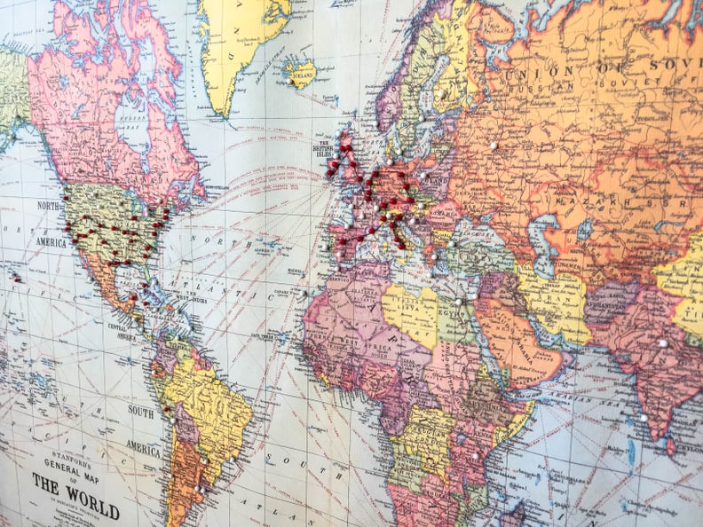 Pinning our travel bucket lists on a large world map