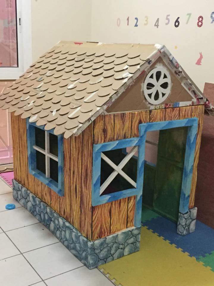 Grandfather Makes Cardboard Playhouse From Cardboard Boxes