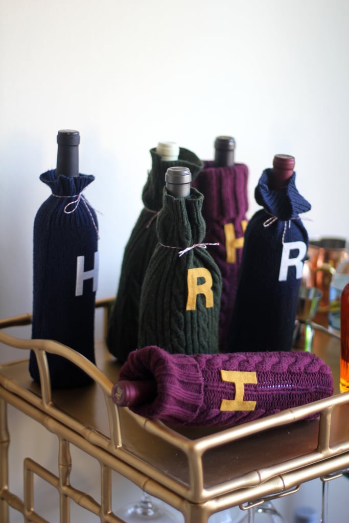 Keep your wines cozy with these DIY Weasley sweaters.