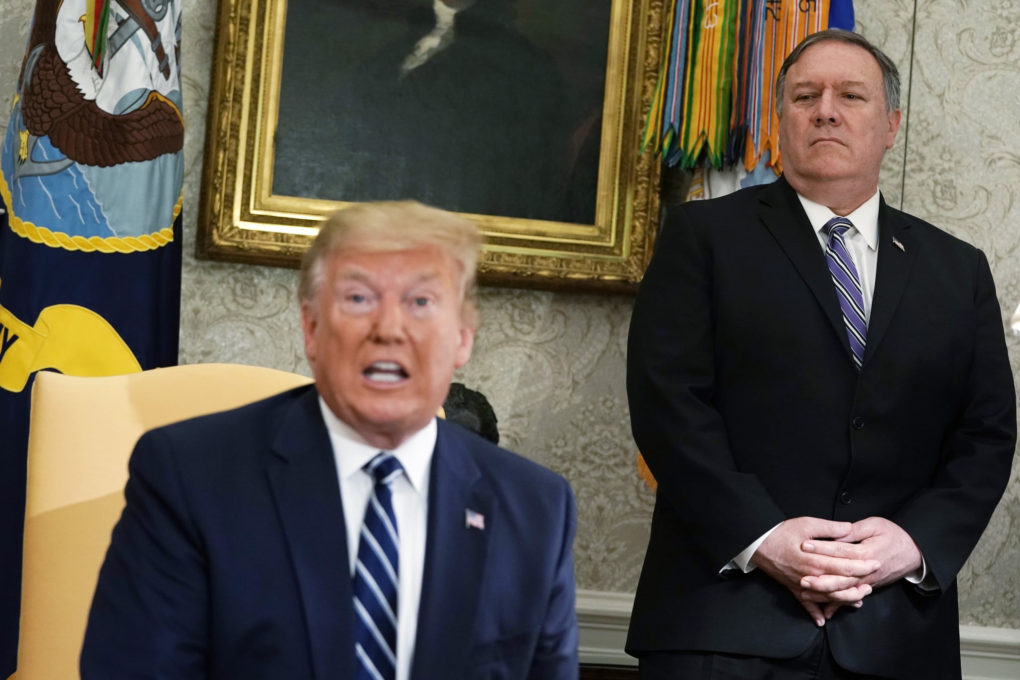 WASHINGTON, DC - JUNE 20:  U.S. Secretary of State Mike Pompeo looks on as President Donald Trump speaks during a meeting with Canadian Prime Minister Justin Trudeau in the Oval Office of the White House June 20, 2019 in Washington, DC. Trump and Trudeau were expected to discuss the trade agreement between the U.S., Canada and Mexico.  (Photo by Alex Wong/Getty Images)