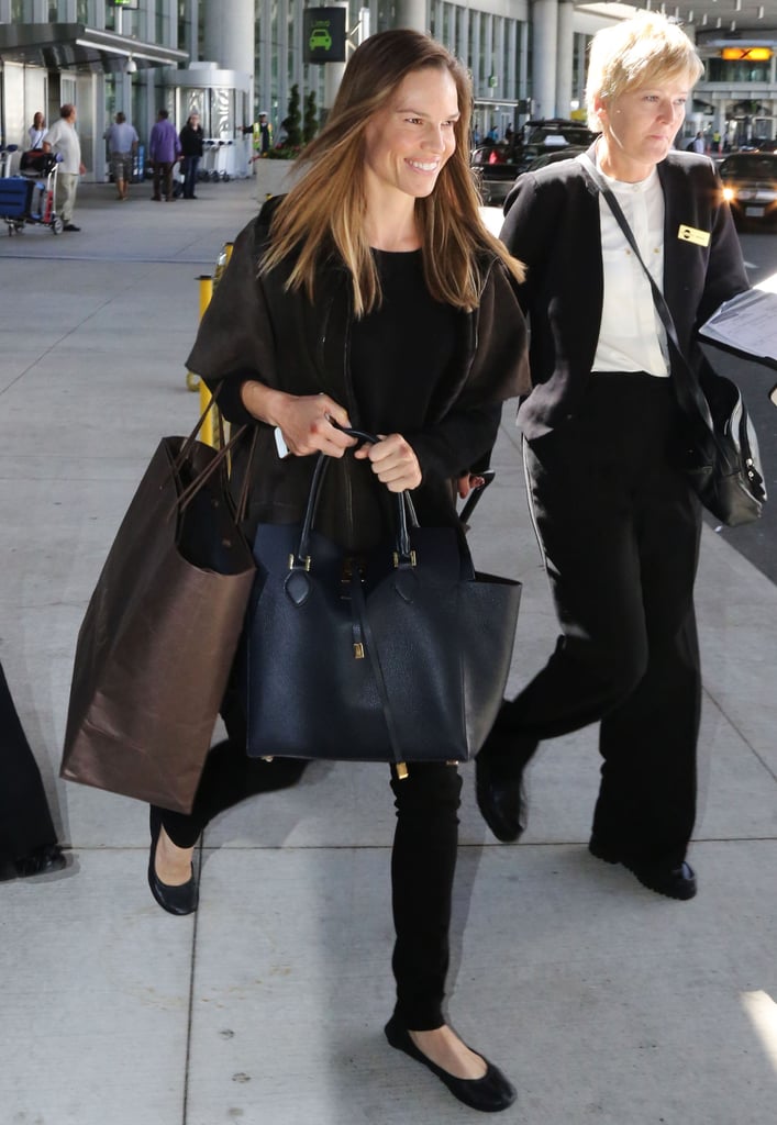 Hilary Swank was sleek in all black while arriving at the airport in Toronto.