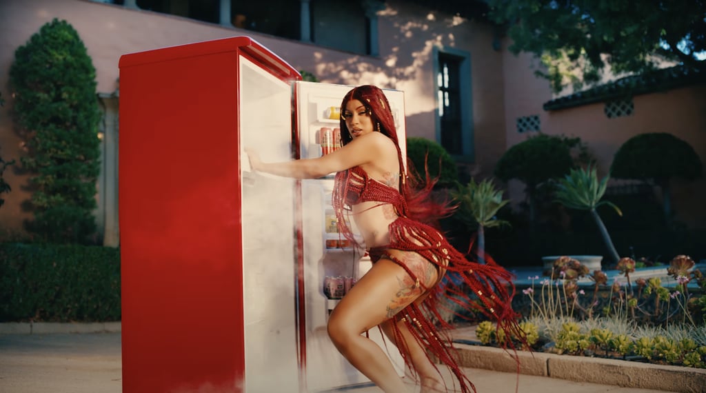 Yep, that's a two-piece made of long red braids — the perfect attire for twerking on a fridge if you ask us. It was custom made by a clothing brand called Caléchie.