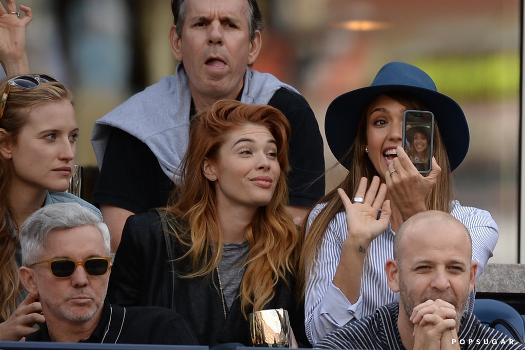 Jessica Alba excitedly captured a picture of herself and friends at the US Open in NYC in September 2013.