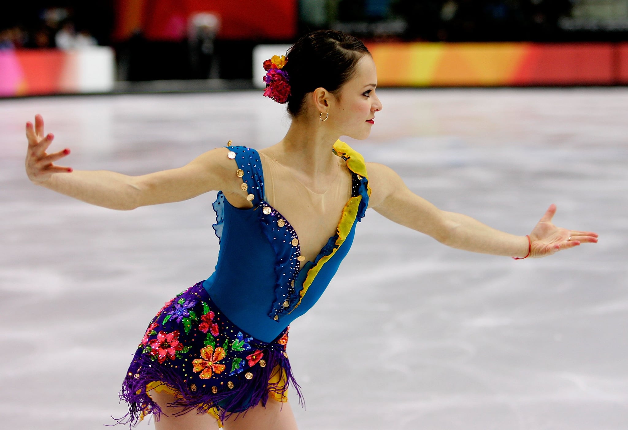 TURIN, ITALY - FEBRUARY 21:  Sasha Cohen of the United States performs during the women's Short Program of the figure skating during Day 11 of the Turin 2006 Winter Olympic Games on February 21, 2006 at Palavela in Turin, Italy.  (Photo by Brian Bahr/Getty Images)