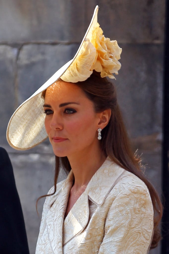 At Zara Phillips's wedding, Kate Middleton wore a cream white hat that came complete with a rose detail.