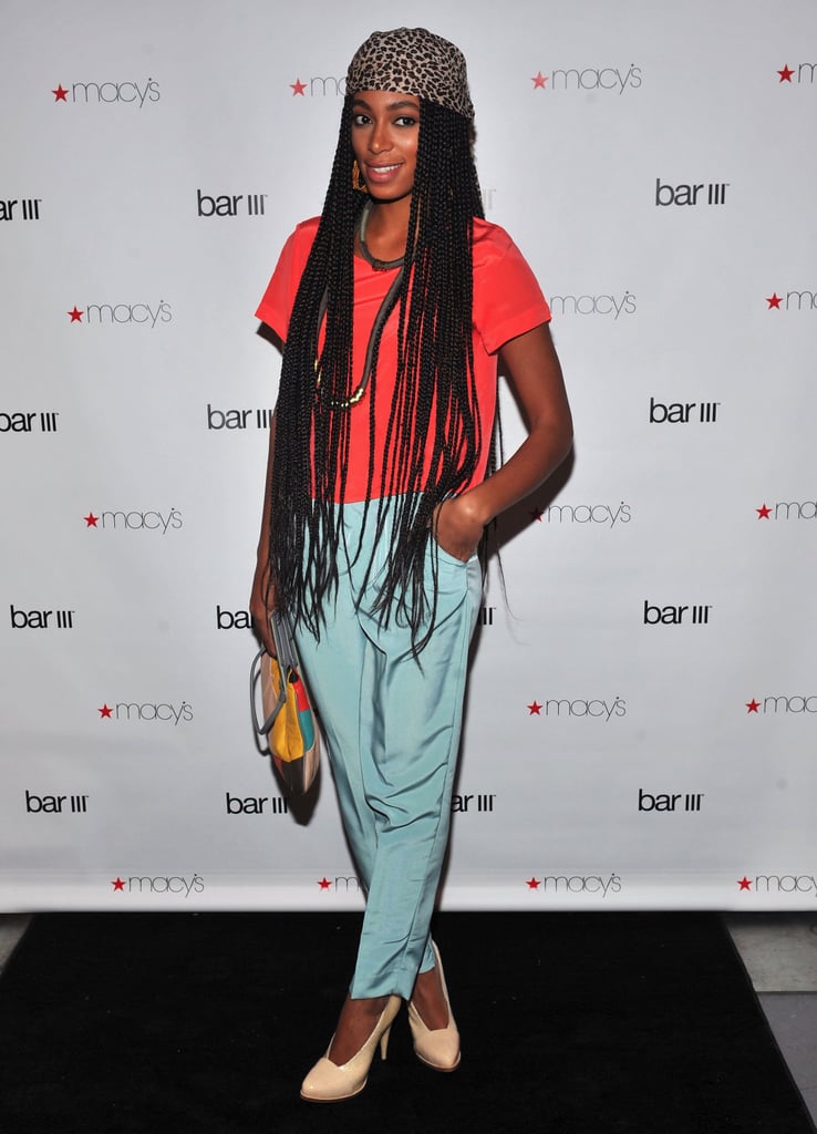 Solange Knowles colorblocked in neon orange and seafoam blue for the Macy's Bar III pop-up launch in February 2011.