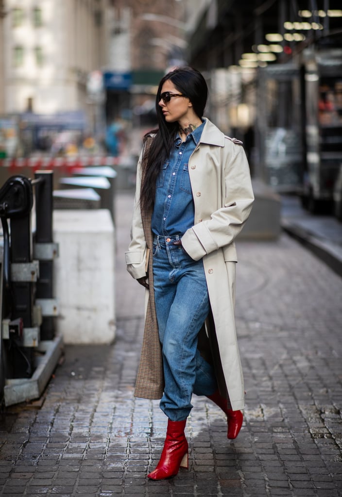 Red shoes look cool in contrast with head-to-toe blue jeans.