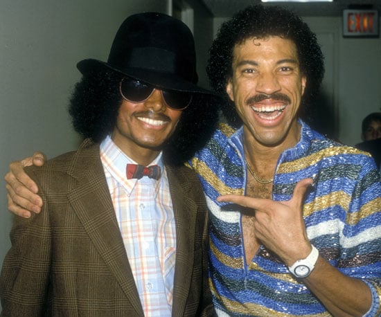 Michael, who is Nicole Richie's godfather, posed with her dad, Lionel, in 1980.