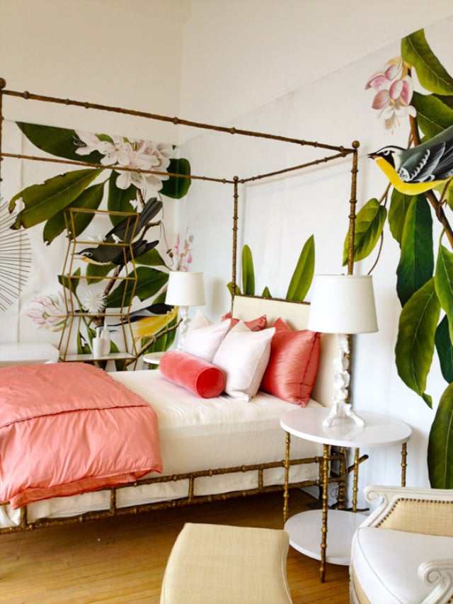 Bamboo furniture and large flora make this bedroom feel just like Tarzan's jungle.