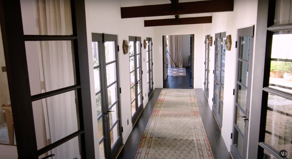 This airy walkway is one of her "favorite parts" of the house because it gets so much natural light.