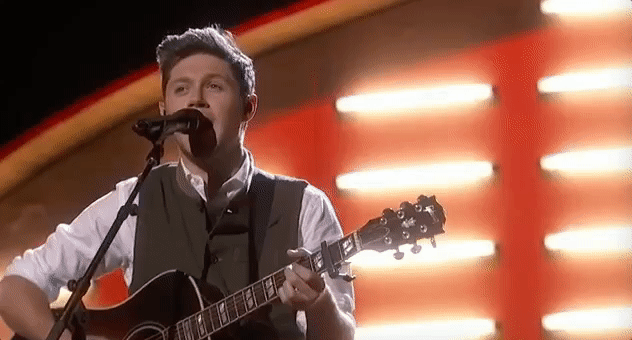 Niall performed "This Town" at the American Music Awards, which was his first solo award show appearance. He was also far friendlier toward Zayn than I probably would have been.