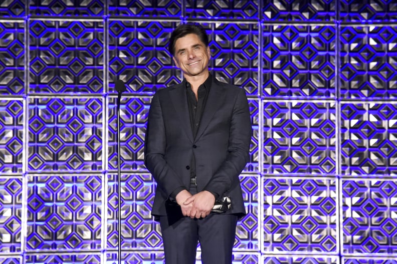 LOS ANGELES, CALIFORNIA - JUNE 12: John Stamos speaks onstage during the Fourth Annual Critics Choice Real TV Awards at Fairmont Century Plaza on June 12, 2022 in Los Angeles, California. (Photo by Michael Kovac/Getty Images for the Critics Choice Real TV