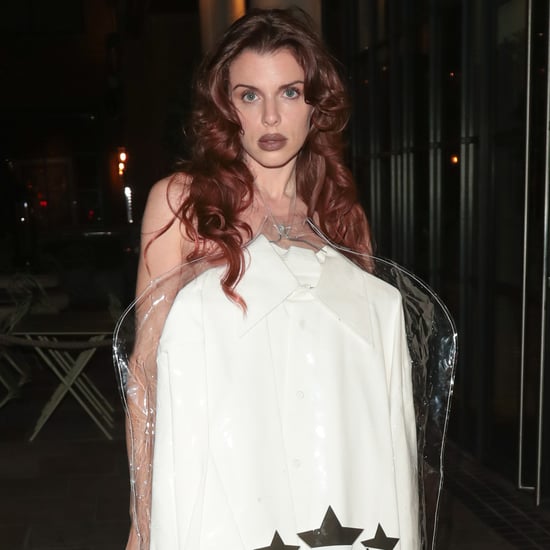 Julia Fox Wears a Figura Services Shirt in a Garment Bag